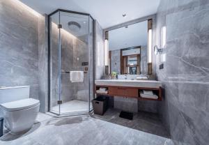 Fotografie z fotogalerie ubytování YISHUI GRAND HOTEl v destinaci Luo-jang
