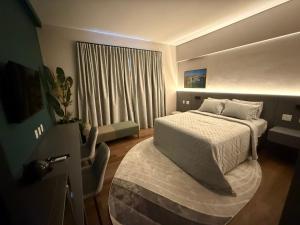 Ένα ή περισσότερα κρεβάτια σε δωμάτιο στο Stay Inn Santos Executivo +17 φωτογραφίες