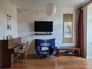 Μια τηλεόραση ή/και κέντρο ψυχαγωγίας στο Comfort Stay Ulaanbaatar