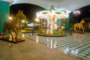 
a statue of a horse in a circus ring at Iberostar Paraiso Beach in Puerto Morelos

