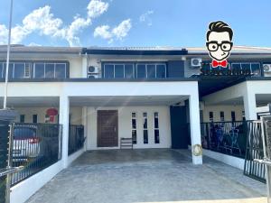 a house with a cartoon face painted on it at Staycation Homestay 15 Kch City Mall Landed House in Kuching