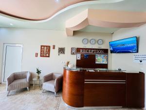 TV i/ili multimedijalni sistem u objektu Family Hotel Avenue 