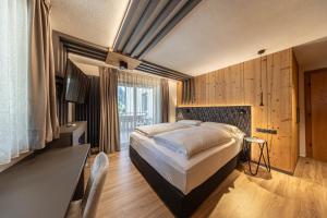 Postel nebo postele na pokoji v ubytování Active Hotel Malita