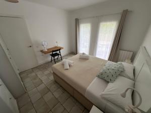 Postel nebo postele na pokoji v ubytování Winahost Apartament Cirerer