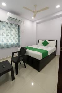 Postel nebo postele na pokoji v ubytování Hotel Rao Palace
