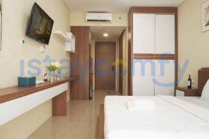 Postel nebo postele na pokoji v ubytování Studio Nagoya Thamrin City Fave Hotel A1202 City View