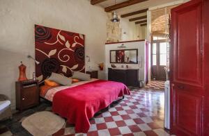 Postel nebo postele na pokoji v ubytování Charming B&B Dar Ta Zeppi + 37 fotografií