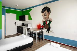 Llit o llits en una habitació de Amsterdam Teleport Hotel