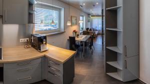 Kuchyň nebo kuchyňský kout v ubytování #1 Ferienwohnung Hochparterre + 6 fotografií