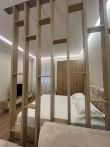 Postel nebo postele na pokoji v ubytování Priam apartment + 9 fotografií