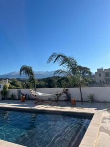 Πισίνα στο ή κοντά στο Christianna Apartments by PosarelliVillas