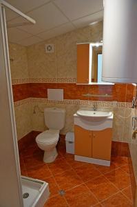 Et badeværelse på GT Green Fort Beach Apartments