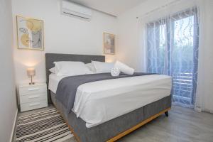 Giường trong phòng chung tại House Laura +27 ảnh