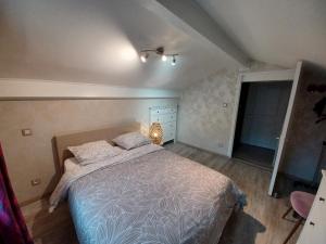 Postel nebo postele na pokoji v ubytování Vue Dégagée au calme
