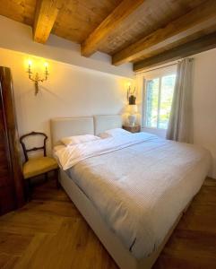 Кровать или кровати в номере Casa del Castello Sleeps 4 Isolabona Italy
