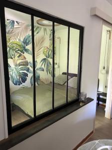 Giường trong phòng chung tại Cocon douillet près du Cours Sextius +3 ảnh