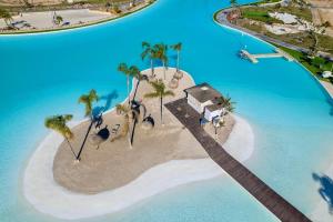 an island in the middle of the ocean with palm trees at Casa Soluna -Santa Rosalia Lake and Life Resort in Torre-Pacheco