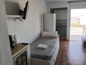 Postel nebo postele na pokoji v ubytování Apartamento a 100m De La Playa + 12 fotografií