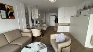 Køkken eller tekøkken på Apartament Gdynia Żeromskiego + 8 billeder