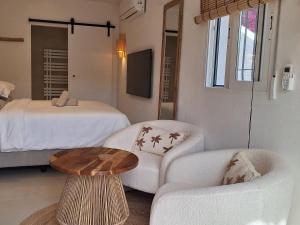 En eller flere senge i et værelse på Estudio Bo Moraira