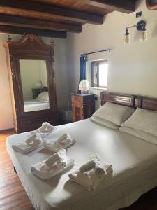 Postel nebo postele na pokoji v ubytování Casa San Bartolomeo