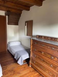 Postel nebo postele na pokoji v ubytování Casa San Bartolomeo