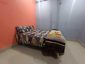 Katil atau katil-katil dalam bilik di Hotel O Home Rk Homes