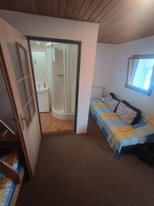 Postel nebo postele na pokoji v ubytování Apartmán Chlumětín