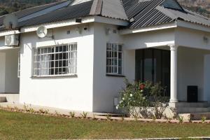 Photo de la galerie de l'établissement The White House Lodge, à Ezulwini 22 autres photos