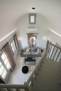 an overhead view of a living room with a couch at Airy Suites Santorini in Oia