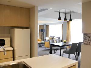 Kuchyň nebo kuchyňský kout v ubytování Grand Mercure Shanghai Hongqiao
