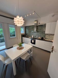 Η κουζίνα ή μικρή κουζίνα στο suite apartment Mestre - strategic to Venice