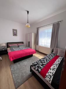 Katil atau katil-katil dalam bilik di Apartmani Odmor Fojnica