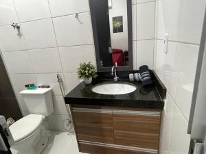 Et badeværelse på Minha Casa Seu Lar