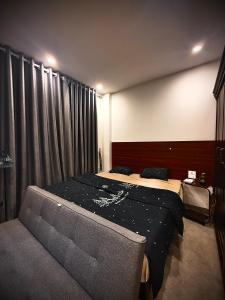 Ένα ή περισσότερα κρεβάτια σε δωμάτιο στο April Box