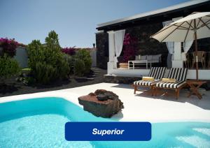 The swimming pool at or close to UNIQUE Homes Lajares - Only Adults