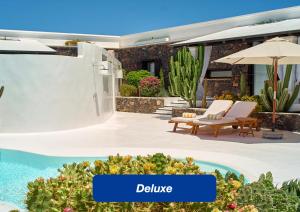 The swimming pool at or close to UNIQUE Homes Lajares - Only Adults