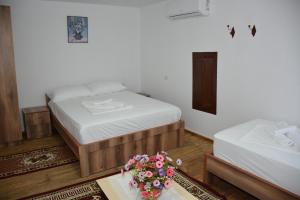 Postel nebo postele na pokoji v ubytování Guest House Marsi