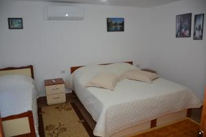 Postel nebo postele na pokoji v ubytování Guest House Marsi + 30 fotografií
