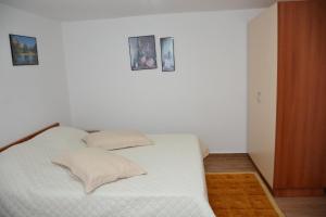 Postel nebo postele na pokoji v ubytování Guest House Marsi