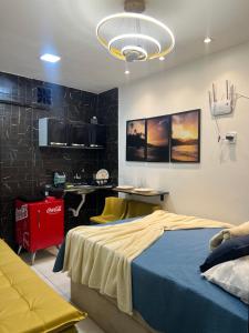 Ένα ή περισσότερα κρεβάτια σε δωμάτιο στο Casa Amarela em Pipa apenas 3 min caminhada ate a praia