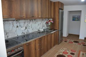 Kuchyň nebo kuchyňský kout v ubytování Guest House Marsi