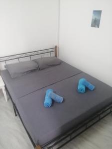 Postel nebo postele na pokoji v ubytování Ô Bercail du Sud-Hibiscus chez Jeannette