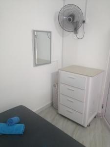 Postel nebo postele na pokoji v ubytování Ô Bercail du Sud-Hibiscus chez Jeannette