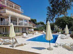Πισίνα στο ή κοντά στο Rooms Vida in Center Novalja With Pool