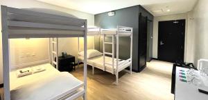 Letto o letti in una camera di PROXY Plus Pangasinan