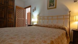 Giường trong phòng chung tại Verde Respiro +9 ảnh