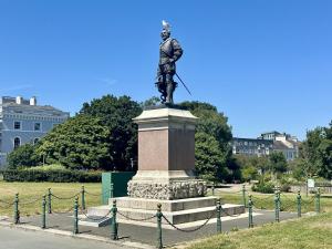 a statue of a man standing on a pedestal at Eden on the Hoe in Plymouth