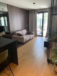 Ein Sitzbereich in der Unterkunft Capitol Suites Exclusive
