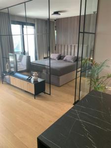 Ein Sitzbereich in der Unterkunft Capitol Suites Exclusive